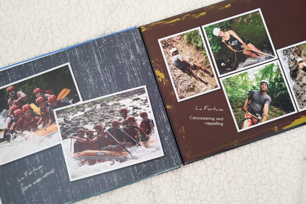 open photobook with photos of adventures