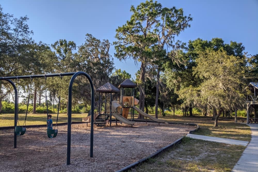 playground surrounded by natural setting at Lake Manatee State Park