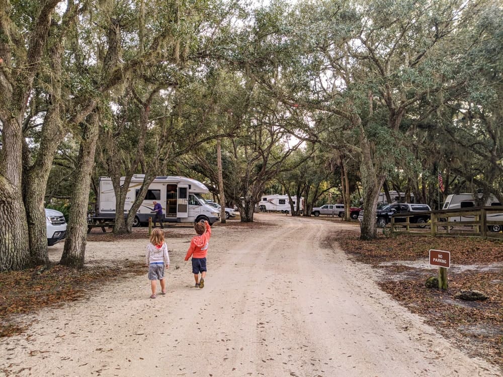 kids walking in campground