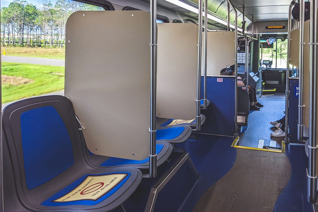 Bus interior showing blocked seats at World Disney World