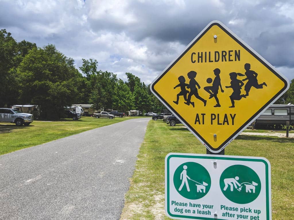 Caution street sign reading "Children at Play" at Hart Springs Park.